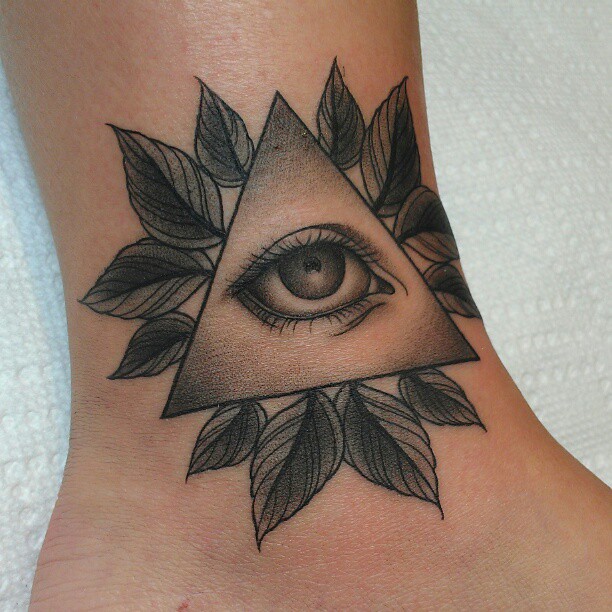 Eye within pyramid black and grey tattoo on the forearm by @jaclyngreb