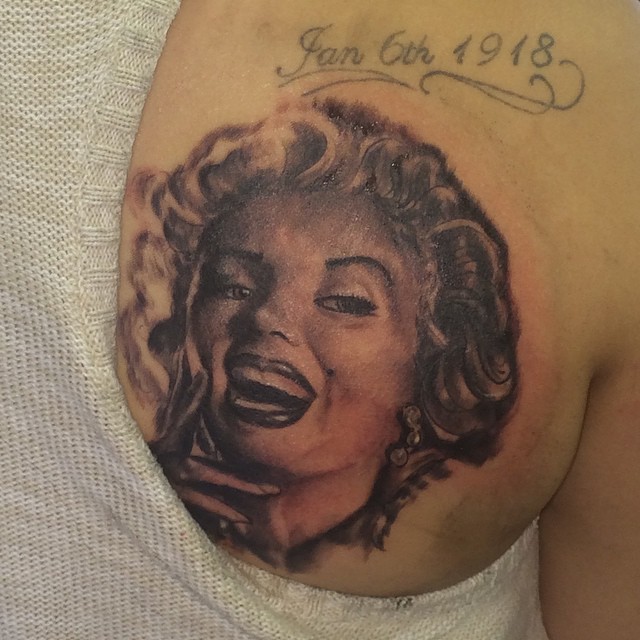 Marilyn Monroe realism tattoo on the shoulder by Sly Davis
