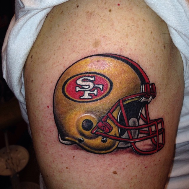 49ers helmet realism tattoo on the thigh by Zac Presley