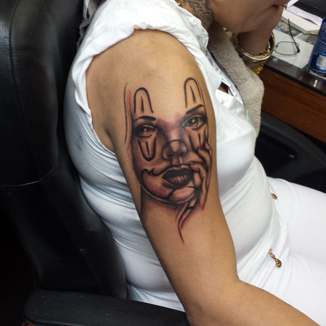 Clown face realism tattoo on the forearm by Tattoos By Mauze