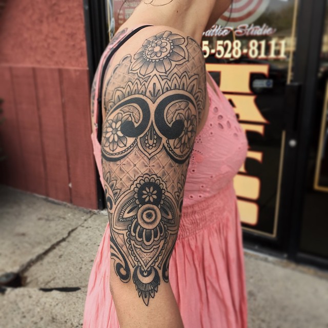 Skull Chicano tattoo on the forearm by Derek Hutchison, Des Moines, Iowa