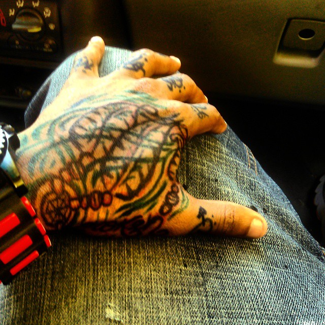 Tattooed hand American traditional tattoo on the hand by Visionary Ink