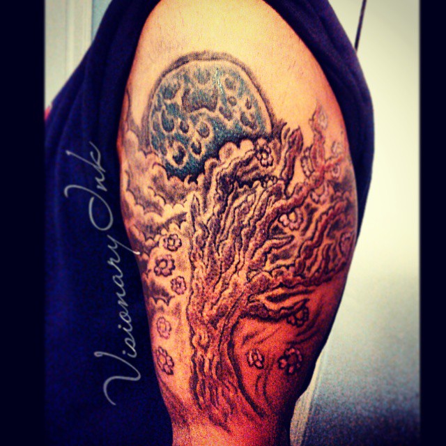 Tree and moon dark art tattoo on the shoulder by Visionary Ink