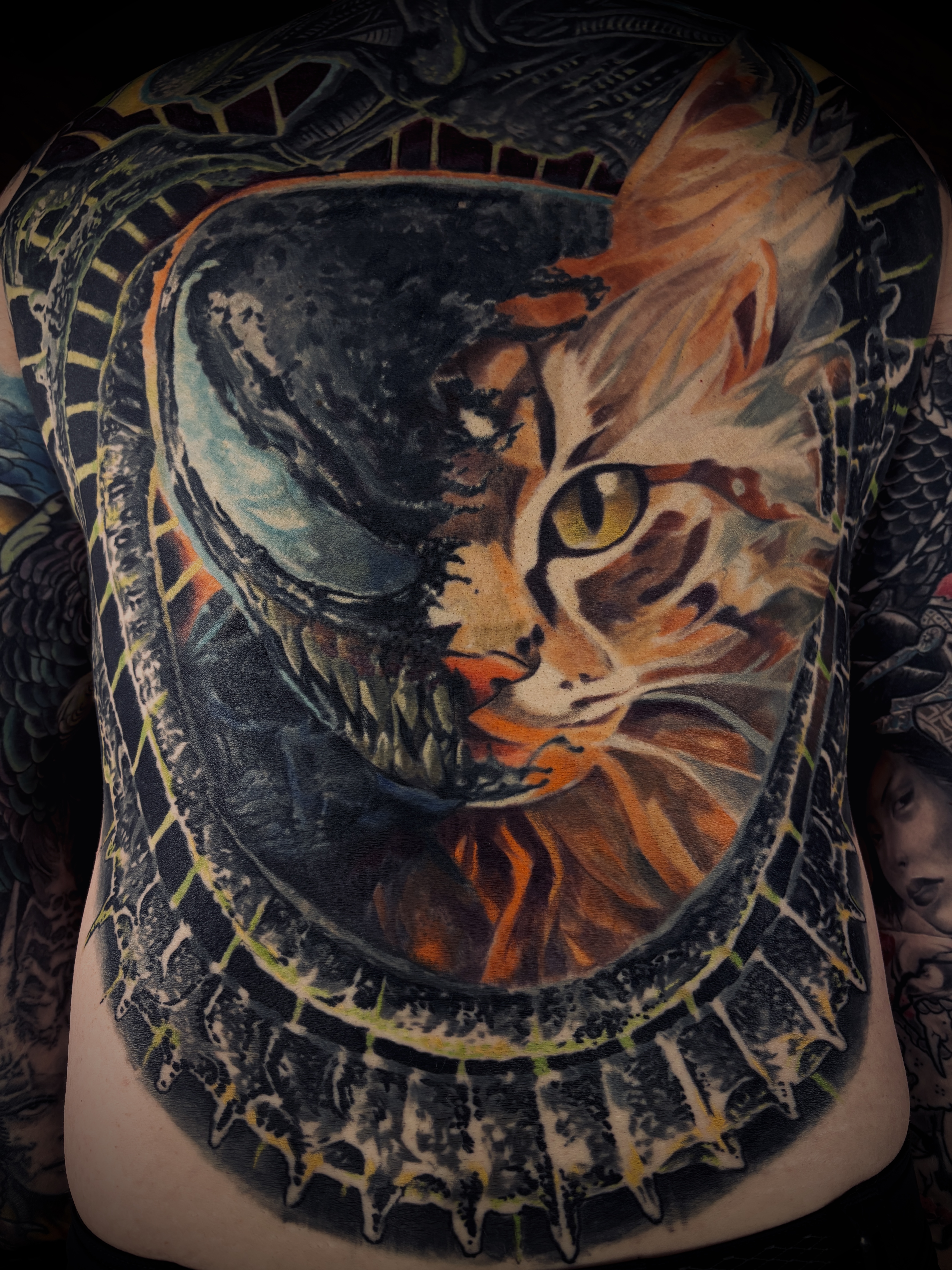 Venom and cat hybrid Japanese tattoo on the back by Mila Tattoo Riga ( Krazzoo ), Riga
