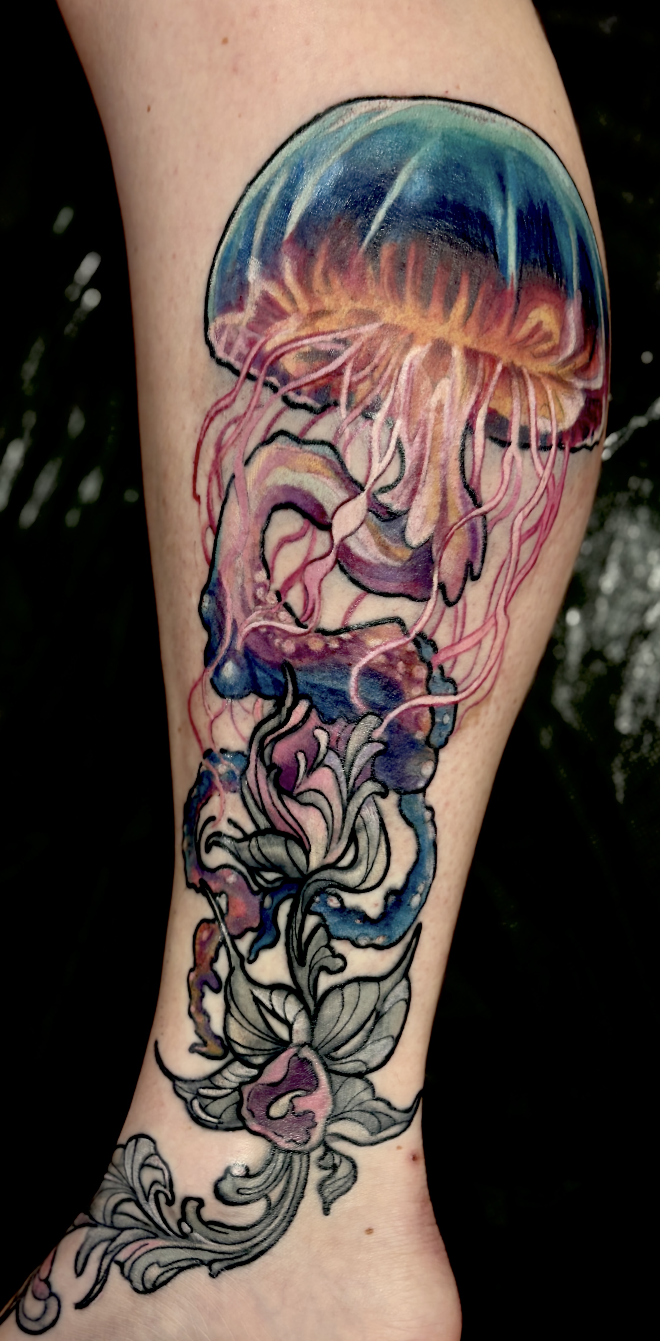Jellyfish and flowers realism tattoo on the calf by Mila Tattoo Riga ( Krazzoo ), Riga