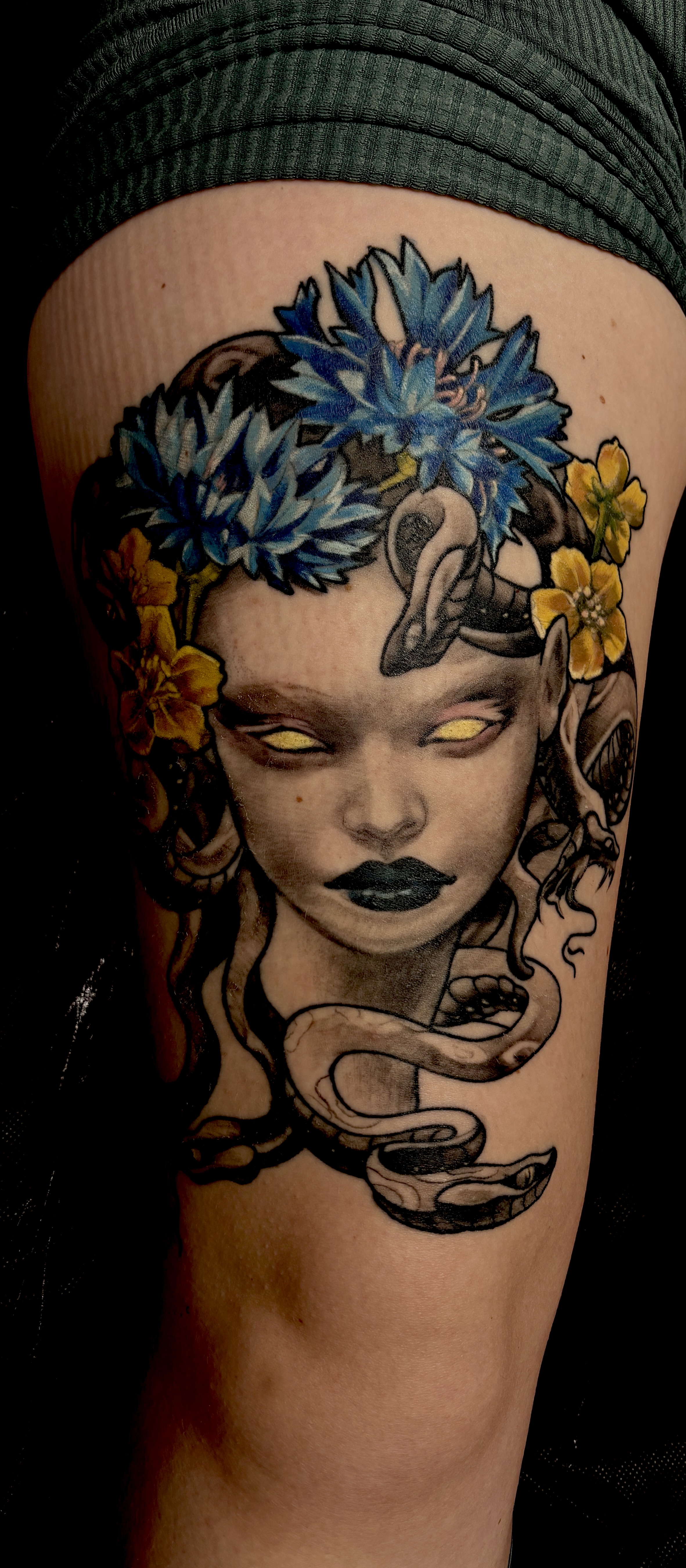 Medusa with snakes and flowers realism tattoo on the thigh by Mila Tattoo Riga ( Krazzoo ), Riga